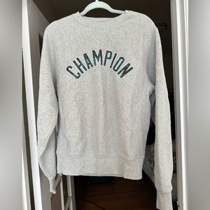 Champion crew neck, heather grey with plaid lettering.